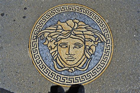 what is the symbol of versace|Versace greek mythology.